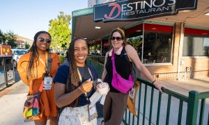 diverse group of women smiling for the camera