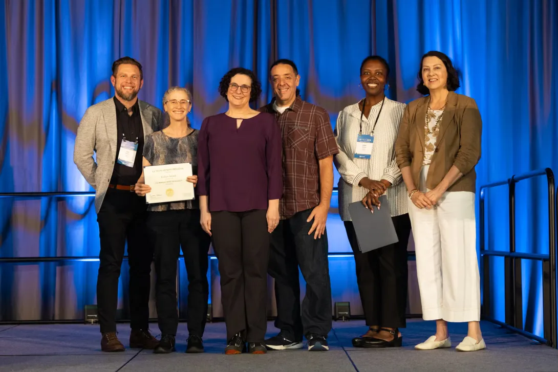 The UC Tech 2025 Gold Award winners for IT Security posing with UC CIOs at the UC Tech Awards Ceremony.